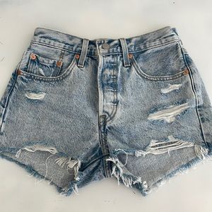 Levi’s 501 denim shorts; size 25; 2.5 inch inseam; medium/light wash